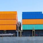 Shipping container twist locks for container stacks