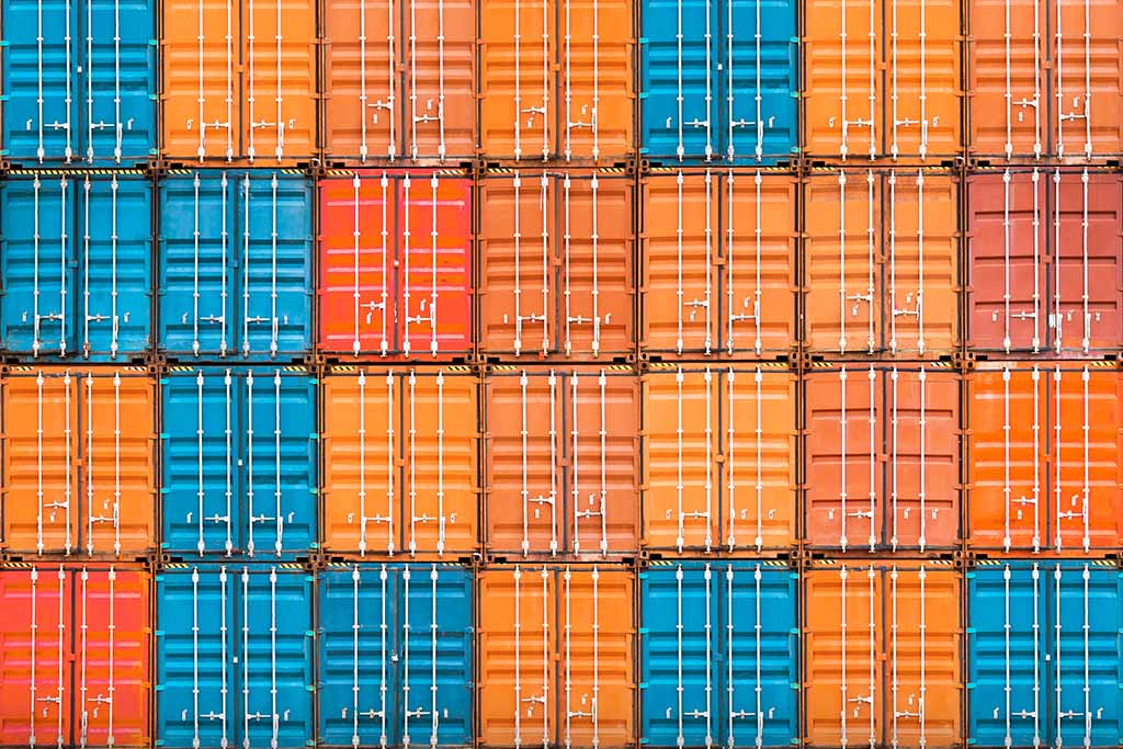 A wall of stacked containers.