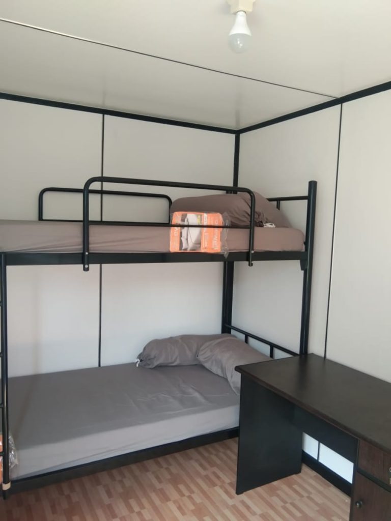 Bunkbed inside a container apartment unit