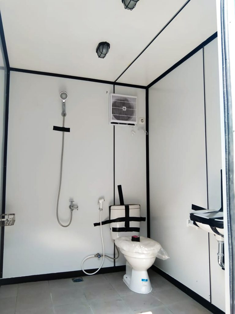 Toilet inside a container apartment